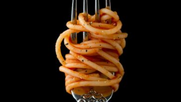 vork met spaghetti, 'una buona forchetta'